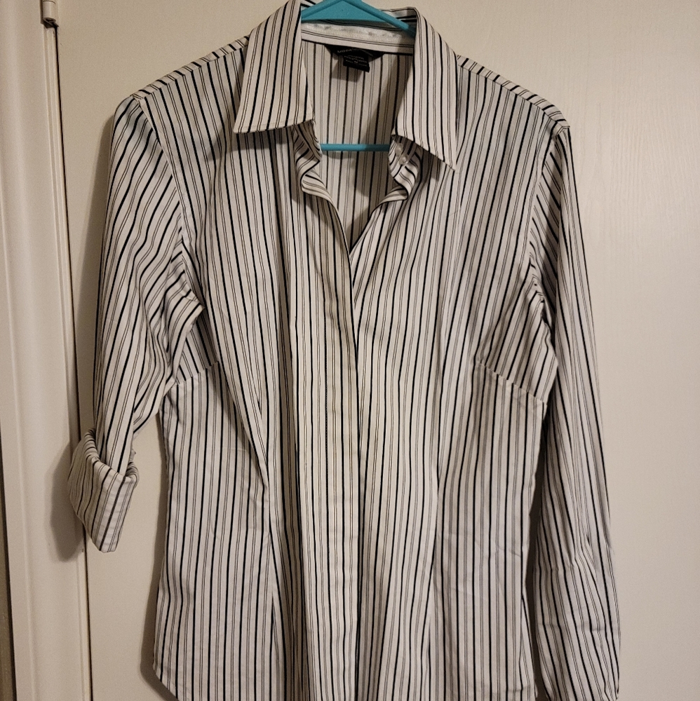 Beautiful long sleeved button up blouse for work!